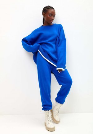 OVERSIZED JOGGER SET  - Pantalones deportivos - blue