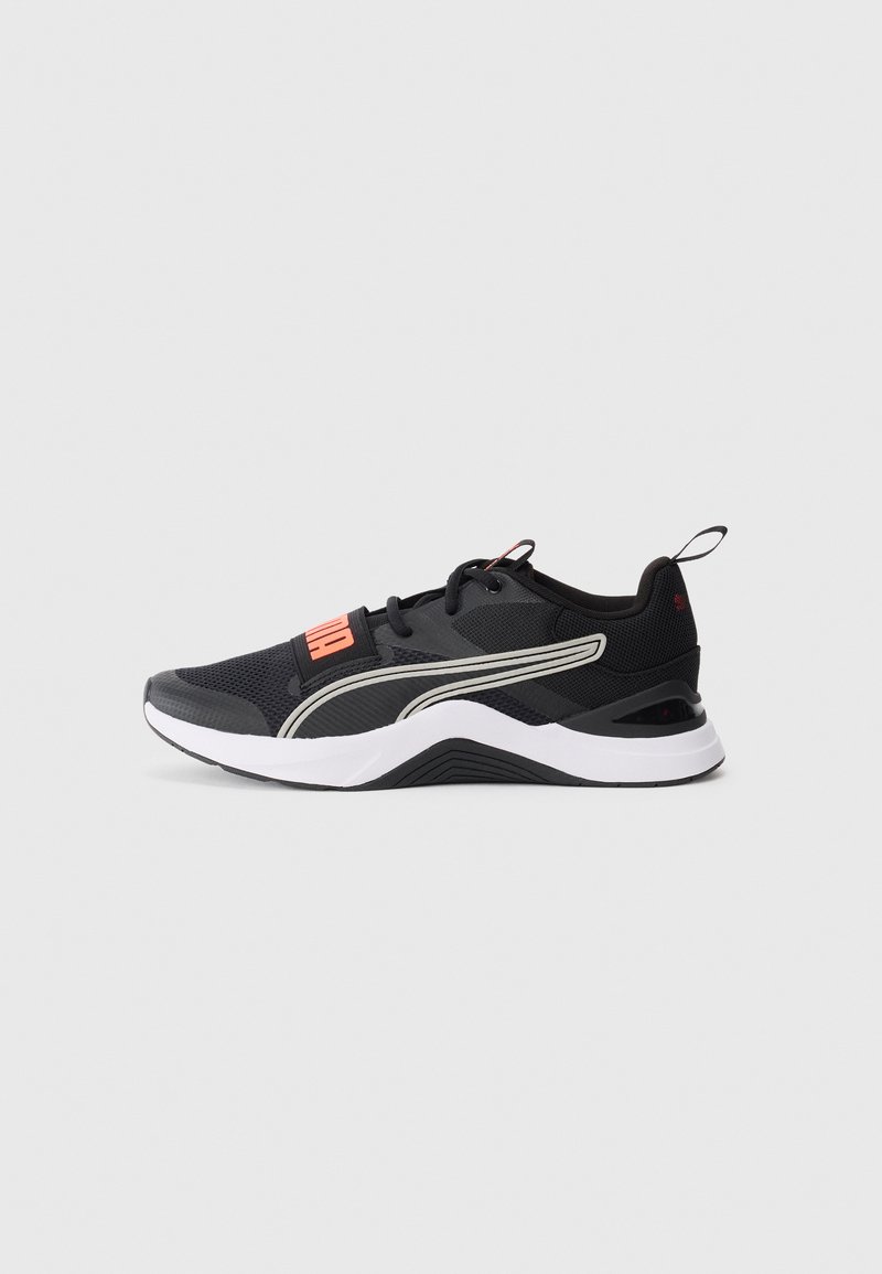 Black athletic shoes with a mesh upper, silver stripes, and a white sole. Features a prominent red logo on the side and a pull tab at the heel.