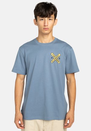 Blue cotton t-shirt with short sleeves, round neckline, featuring a yellow graphic design on the chest that reads "TIM ELEMENT."