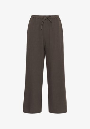 Pantalon marron ample à jambes larges avec taille élastique et cordon ajustable, fabriqué en tissu texturé.