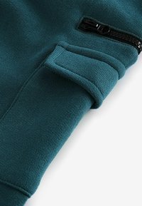 Next UTILITY JOGGERS.  - REGULAR FIT - Kapsáče - teal blue