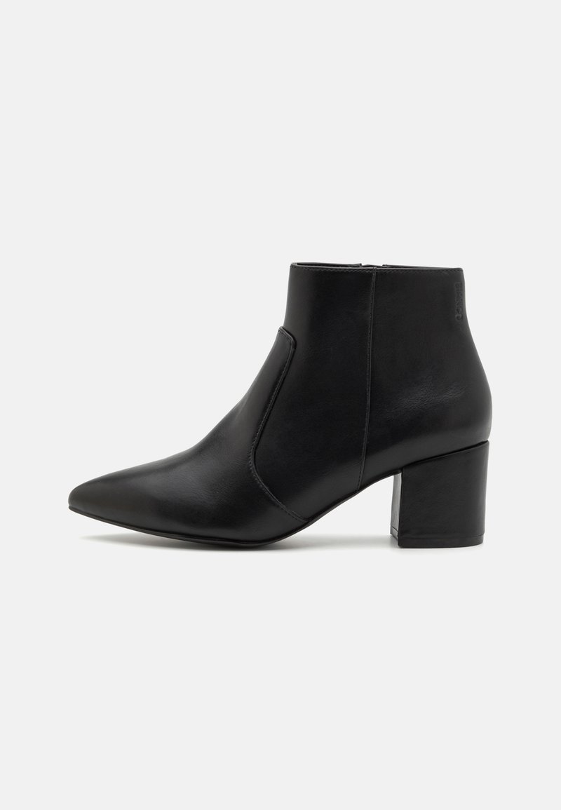 Black leather ankle boot with a pointed toe and block heel. Features a sleek design and minimal stitching accents.