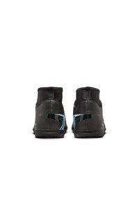 Black athletic shoes with a high-top design, featuring a smooth texture, contrasting blue accents, and a sleek shape.