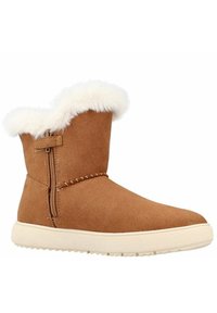 Botas de ante marrón con cuello de piel sintética blanca, cremallera lateral y suela de goma blanca. Presenta detalles de costura a lo largo de la parte superior.