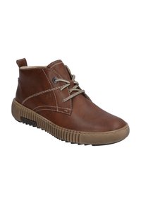 Stivali ankle in pelle marrone con cuciture chiare, punta rotonda e suola in gomma texturizzata. Presentano un design con lacci e una piccola linguetta alla caviglia.