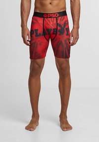 Boxer-briefs rouges avec une taille élastique noire, comportant le texte et le logo "PLAYBOY" en gras noir, fabriqués dans un tissu lisse et extensible.