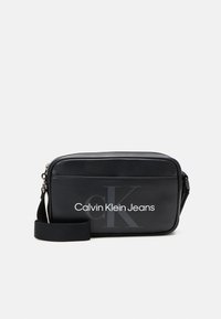 Calvin Klein Jeans MONOGRAM SOFT CAMERA BAG UNISEX - Cross body bag - black