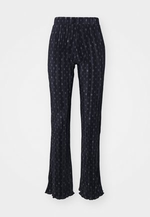 Laivastonsiniset housut, joissa on pinstripe-kuvio ja pieniä pyöreitä kuvioita. Laajeneva lahje, joustava vyötärö ja pleatattu pinta.