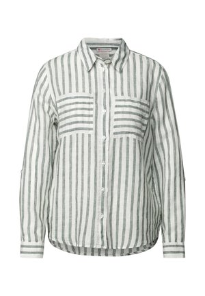Chemise en lin légère à rayures blanches et vertes. Présente un front à boutons, deux poches poitrine et des manches longues avec un léger arrondi à l'ourlet.