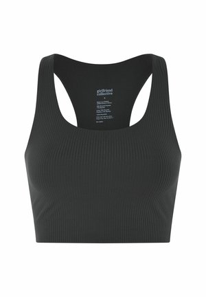 Bra sportivo nero a coste con spalline larghe, scollo rotondo e design a schiena scoperta, realizzato in poliestere riciclato. Presenta l'etichetta del marchio sul retro.