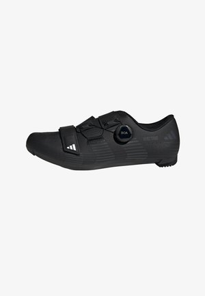 Black cycling shoes with a streamlined design, BOA adjustment system, textured surface, and contrasting white branding details.