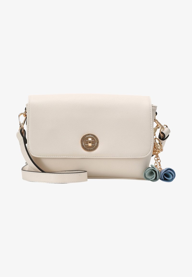 Cream faux leather bag with a gold circular clasp, adjustable strap, and decorative blue and green flower accents on a chain.