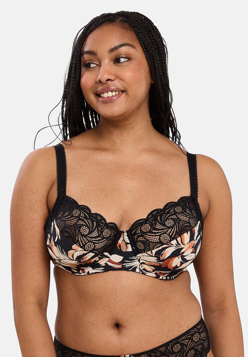 Reggiseno in pizzo nero con motivi floreali in tonalità di arancio e crema, con un design scallop, supporto con ferretto e un fiocco decorativo al centro.