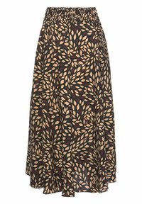 A flowing black skirt featuring a bold pattern of leaves in cream, red, and mustard colors, gathered at the waist for comfort.