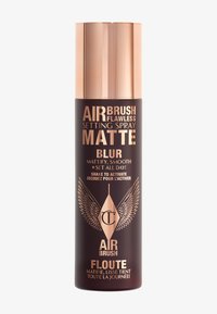 Matte black cylindrical spray bottle with a metallic rose gold lid. Label features dark gold text and wing motif, indicating setting spray.