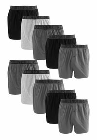 Boxershorts in verschiedenen Farben: schwarz, grau und weiß. Weicher Stoff mit einem elastischen Bund, der mit "NEXT" gekennzeichnet ist. Drei Paare haben Knöpfe.