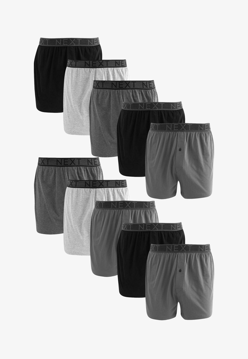 Caleçons de différentes couleurs : noir, gris et blanc. Tissu doux avec une ceinture élastique étiquetée "NEXT". Trois paires ont des boutons.