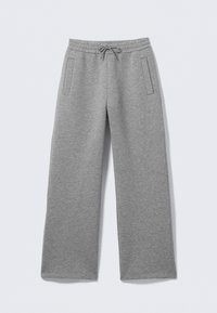 Pantalon de survêtement gris à jambes larges avec taille à cordon et deux poches latérales, posé à plat sur un fond blanc.