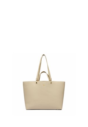 Beżowa torba na ramię o fakturowanej powierzchni z podwójnymi uchwytami, małym złotym logo na przedzie oraz o wyraźnie zarysowanym, prostokątnym kształcie na białym tle.