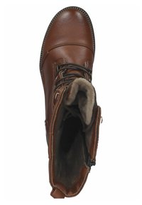 Botte en cuir marron avec des lacets et une fermeture éclair sur le côté. Intérieur doublé de fourrure douce. Bout arrondi et surpiqûre contrastante le long de la semelle.