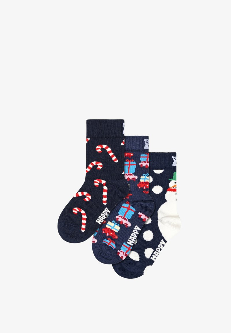 Balení tří ponožek s barevnými vzory: jedny s cukrovými hůlkami, druhé s dárky a poslední s puntíky a sněhulákem.