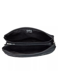 Black zippered pouch with a textured exterior, featuring two internal compartments and a "Kipling Live Light" label. Soft fabric lining.