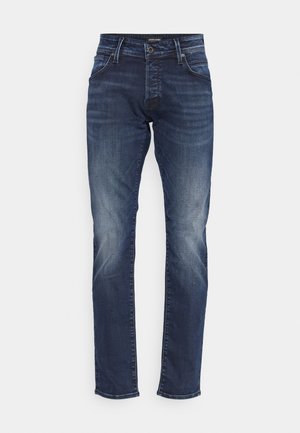 Granatowe dżinsy o prostym kroju, z wyblakłym wykończeniem, pięcioma kieszeniami oraz metalowym zapięciem na guziki.