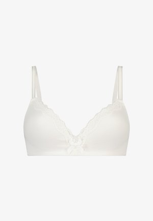 Witte beha met kantinleg langs de halslijn, verticale ribbelstructuur en een klein strikje in het midden. Verstelbare bandjes.
