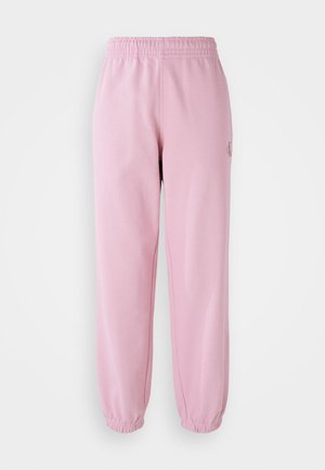 Roze trainingsbroek met een elastische tailleband en verzamelde boorden. Gemaakt van zachte stof, met een klein logo-detail aan de voorkant.