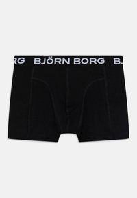 Black boxer shorts made of soft fabric, featuring a wide elastic waistband with "BJÖRN BORG" in white lettering, double-stitched details.