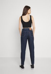 Levi's® HIGH WAISTED MOM JEAN - Mom Jeans - ocean
