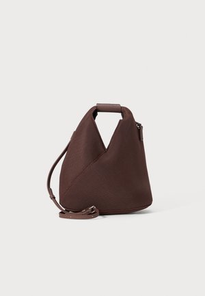 Brown textured handbag with an angular design, featuring a top handle and detachable shoulder strap. Material appears durable and structured.