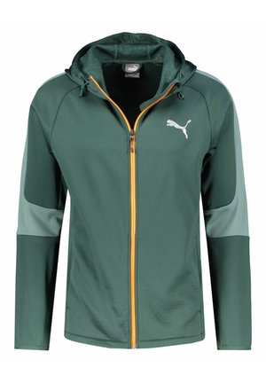 Veste à capuche Puma verte avec des détails sur les manches vert clair et une fermeture éclair avant orange, présentée de face sur fond blanc.