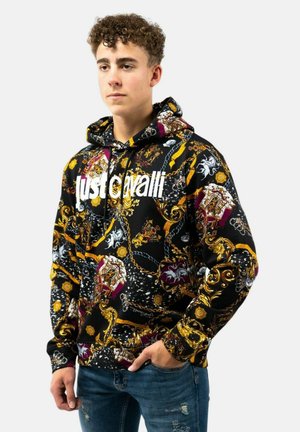 Felpa con cappuccio di base nera, decorata con intricate fantasie dorate e colorate, logo bianco in evidenza e polsini a costine.