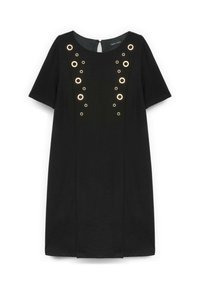 Vestido negro de manga corta con escote redondo, con adornos simétricos de anillos metálicos de diferentes tamaños en la parte frontal.