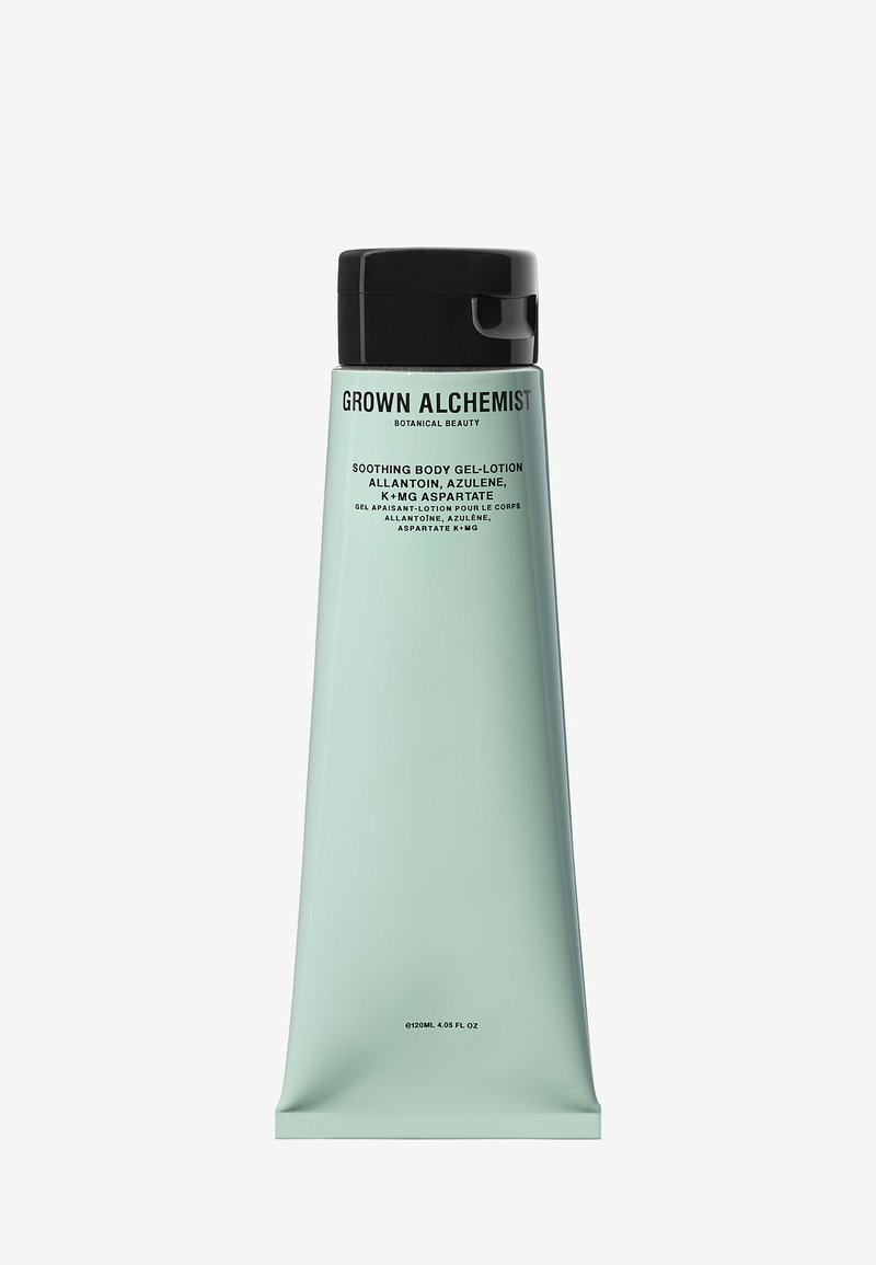 Green tube with a black cap, labeled "Grown Alchemist Soothing Body Gel-Lotion." Contains 120ml, features minimalist design and modern typography.