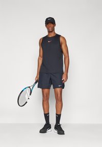 Nike Performance COURT SLAM TANK  - Top - black/light wild mango