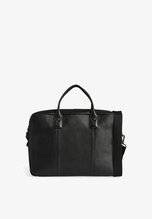 Serviette en cuir noir avec double poignée et une bandoulière réglable, présentée sur fond blanc.
