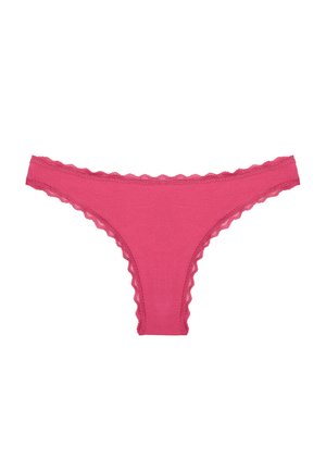 Rosa String-Tanga mit Spitzenbesatz, aus weichem Stoff gefertigt. Mit gewellten Kanten entlang des Bunds und der Beinöffnungen.