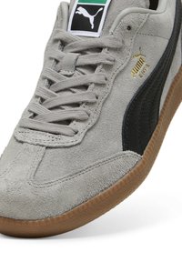 Puma LIGA - Tenisice - concrete gray black gold