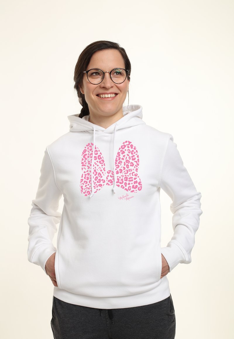 Vit hoodie med en stor rosa leopardmönstrad rosett-grafik. Har en dragsko i huvan och fickor. Mjuk tyg med en avslappnad passform.