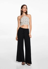 Mango Kids Hlače - black