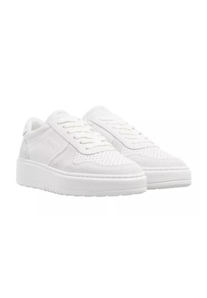 Pair of low-top white sneakers with perforated toe area, lace-up front, and thick textured soles shown at three-quarter angle.