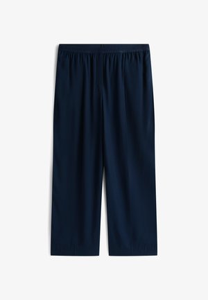 Tamsiai mėlynos trumpos kelnės su elastingu juosmeniu, pasižyminčios lygia tekstūra ir tiesiu pjūviu, be matomų kišenių ar papuošimų.