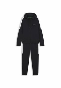 Black hoodie and pants set, featuring zip front, hood, and logo accents. Made of soft fabric with contrasting white side panels.