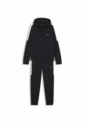 Black hoodie and pants set, featuring zip front, hood, and logo accents. Made of soft fabric with contrasting white side panels.