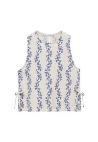 Haut sans manches à motif floral beige avec des motifs bleus, présentant un col rond et des liens latéraux réglables pour un ajustement personnalisé.