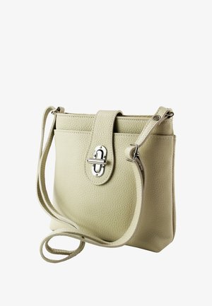 Leather crossbody bag in light beige with a textured finish, features a snap closure, adjustable strap, and minimal hardware accents.