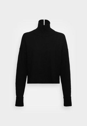 Stickad tröja - black
