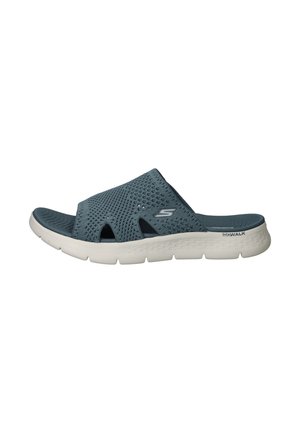 Blauwe mesh slide sandaal met een slip-on ontwerp, voorzien van een open teen en zijuitsparingen. Lichtgewicht witte zool met een gestructureerd loopprofiel.